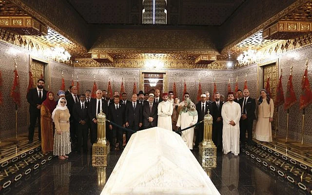 Jewish-Muslim delegation praying together at the graves of the Kings of Morocco